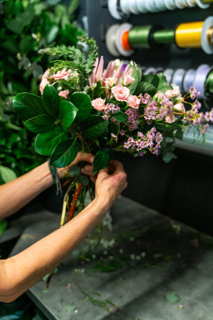 This is me, arranging flowers whilst hiding from the camera!